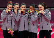 <a href="http://sports.yahoo.com/olympics/gymnastics/mc-kayla-maroney-1134462/" data-ylk="slk:McKayla Maroney;elm:context_link;itc:0;sec:content-canvas" class="link ">McKayla Maroney</a>, <a href="http://sports.yahoo.com/olympics/gymnastics/kyla-ross-1133582/" data-ylk="slk:Kyla Ross;elm:context_link;itc:0;sec:content-canvas" class="link ">Kyla Ross</a>, <a href="http://sports.yahoo.com/olympics/gymnastics/alexandra-raisman-1134192/" data-ylk="slk:Alexandra Raisman;elm:context_link;itc:0;sec:content-canvas" class="link ">Alexandra Raisman</a>, <a href="http://sports.yahoo.com/olympics/gymnastics/gabrielle-douglas-1132742/" data-ylk="slk:Gabrielle Douglas;elm:context_link;itc:0;sec:content-canvas" class="link ">Gabrielle Douglas</a> and <a href="http://sports.yahoo.com/olympics/gymnastics/jordyn-wieber-1131093/" data-ylk="slk:Jordyn Wieber;elm:context_link;itc:0;sec:content-canvas" class="link ">Jordyn Wieber</a> of the United States celebrate after winning the gold medal in the Artistic Gymnastics Women's Team final on Day 4 of the London 2012 Olympic Games at North Greenwich Arena on July 31, 2012 in London, England. (Photo by Jamie Squire/Getty Images)