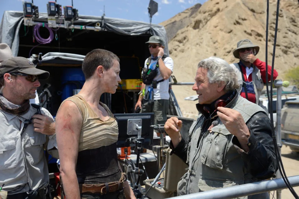 Charlize Theron with director George Miller on the set of Mad Max: Fury Road. (Warner Bros Pictures)