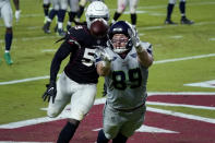 Seattle Seahawks tight end Will Dissly (89) can't pull in a catch in the end zone as Arizona Cardinals outside linebacker De'Vondre Campbell (59) defends during the second half of an NFL football game, Sunday, Oct. 25, 2020, in Glendale, Ariz. (AP Photo/Rick Scuteri)