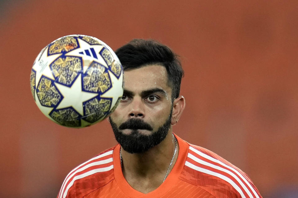 India’s Virat Kohli attends a practice session ahead of their ICC Cricket World Cup match against Pakistan in Ahmedabad, India, Friday, Oct. 13, 2023. (AP Photo/Rajanish Kakade)