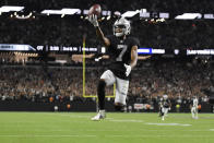 Las Vegas Raiders wide receiver Zay Jones (7) celebrates after scoring a game winning touchdown against the Baltimore Ravens during overtime in an NFL football game, Monday, Sept. 13, 2021, in Las Vegas. (AP Photo/David Becker)