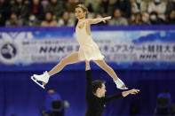 Kirsten Moore-Towers and Michael Marinaro of Canada perform in the pairs free skating program during the ISU Grand Prix of Figure Skating in Sapporo, northern Japan, Saturday, Nov. 23, 2019. (AP Photo/Toru Hanai)