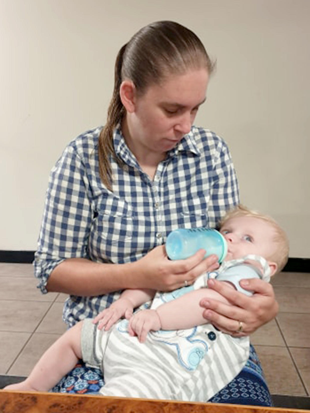 Joanne Campbell feeds her son Hayden with the help of other mums online Photo: Caters