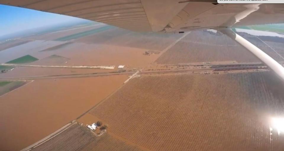 A Tulare County Sheriff’s aircraft flies over a flooded area of the county Sunday morning. Allensworth and Alpaugh were under evacutaion orders.