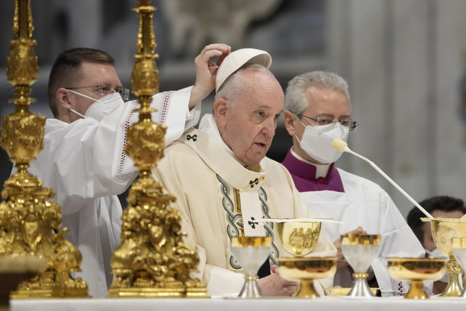 Pope Francis celebrates Mass on the occasion of the Christ the King festivity, in St. Peter's Basilica at the Vatican, Sunday, Nov. 21, 2021. (AP Photo/Andrew Medichini)
