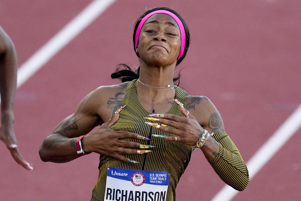 Sha'Carri Richardson celebrates her win in the wins women's 100-meter run final during the U.S. Track and Field Olympic Team Trials Saturday, June 22, 2024, in Eugene, Ore. (AP Photo/Chris Carlson)