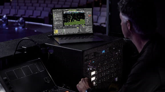  An engineer using the new Shure Wireless Workbench on his laptop. 