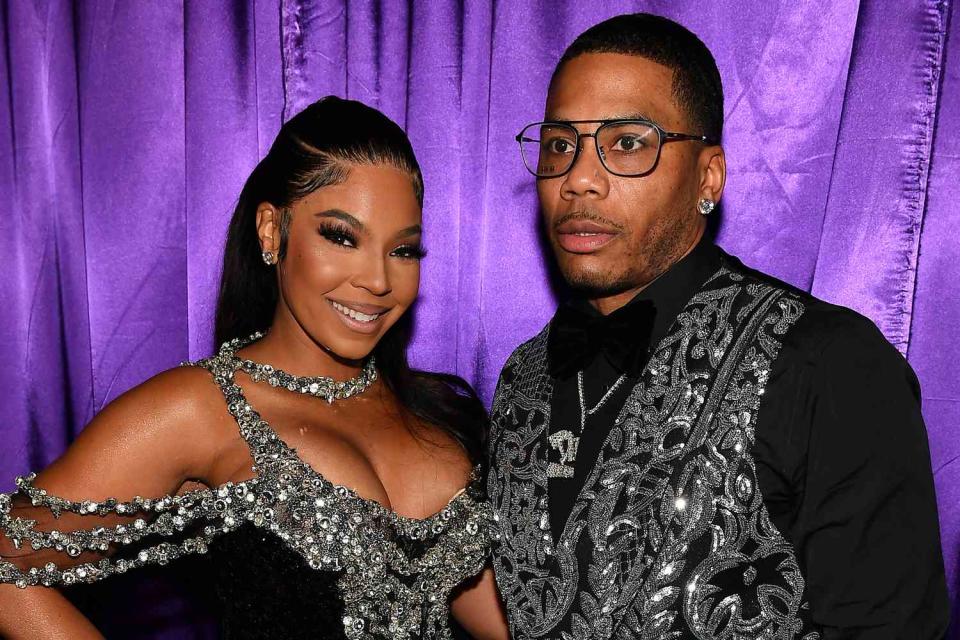 <p>Paras Griffin/Getty </p> Ashanti and Nelly in June 2023