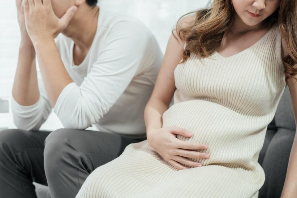 <p>Getty</p> A pregnant couple having an argument