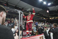 Denver forward Connor Caponi (22) celebrates after defeating Boston College in the championship game of the Frozen Four NCAA college hockey tournament Saturday, April 13, 2024, in St. Paul, Minn. Denver won 2-0 to win the national championship. (AP Photo/Abbie Parr)