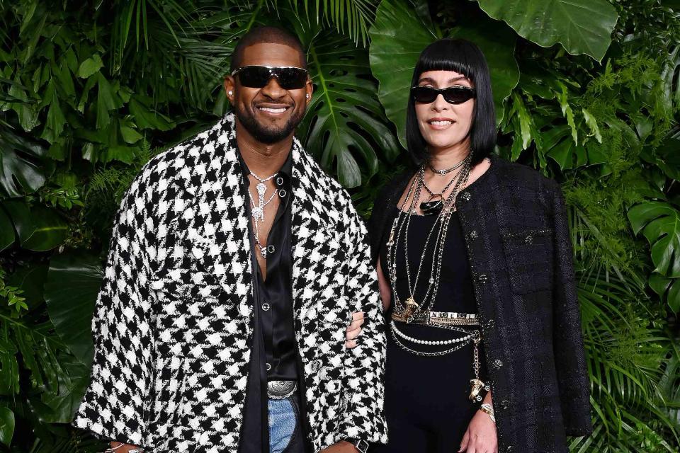 <p>Jon Kopaloff/WireImage</p> Usher and Jennifer Goicoechea attend the Chanel and Charles Finch Annual Pre-Oscar Dinner