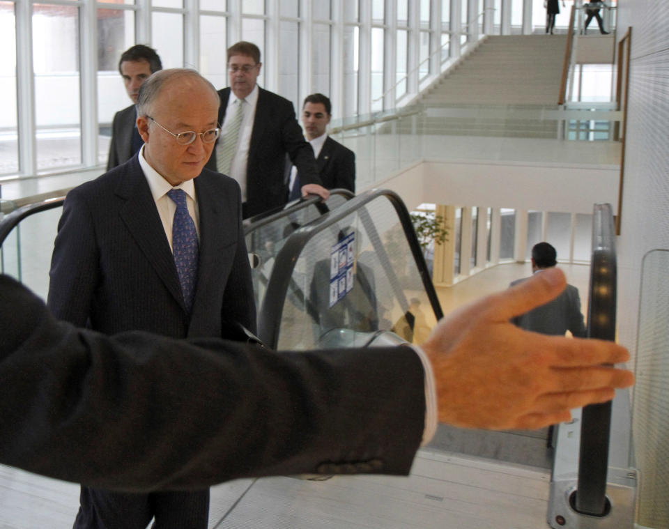 Director General of the International Atomic Energy Agency, IAEA, Yukiya Amano from Japan arrives for the IAEA board of governors meeting at the International Center, in Vienna, Austria, on Thursday, March 8, 2012. (AP Photo/Ronald Zak)