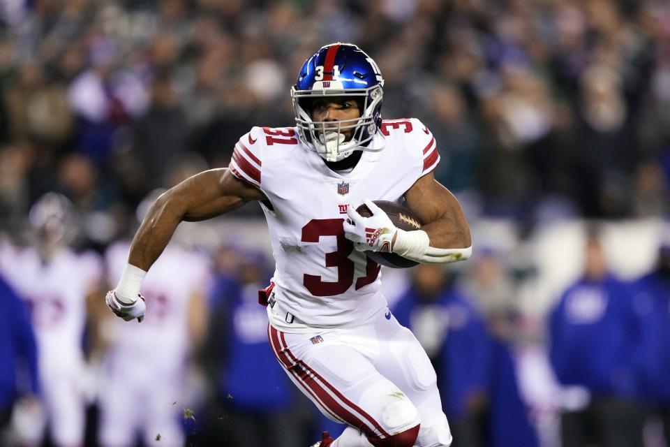 New York Giants running back Matt Breida runs for a touchdown against the Philadelphia Eagles during the second half of an NFL divisional round playoff football game, Saturday, Jan. 21, 2023, in Philadelphia. (AP Photo/Matt Slocum)