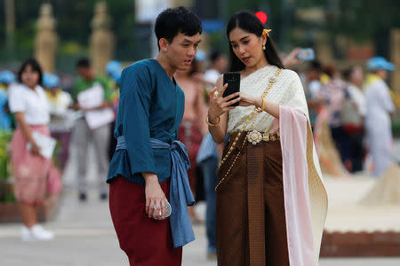 Venerating the past, traditional costume fever grips Thailand