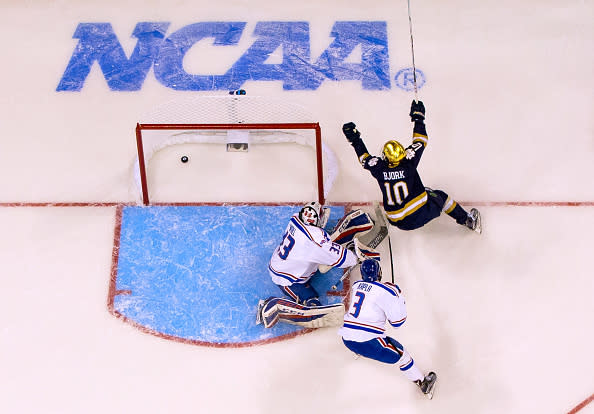 MANCHESTER, NH – MARCH 26: Anders Bjork #10 of the Notre Dame Fighting Irish celebrates a goal by teammate Cam Morrison #26 against Tyler Wall #33 of the Massachusetts Lowell River Hawks during the NCAA Division I Men’s Ice Hockey Northeast Regional Championship final at the SNHU Arena on March 26, 2017 in Manchester, New Hampshire. The Fighting Irish won 3-2 in over time and advance to the Frozen Four. (Photo by Richard T Gagnon/Getty Images)