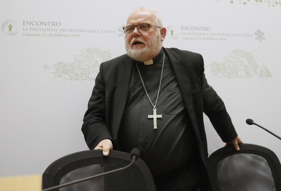 Cardinal Reinhard Marx leaves at the end of a media briefing during a four-day sex abuse summit called by Pope Francis, in Rome, Saturday, Feb. 23, 2019. Pope Francis is hosting a four-day summit on preventing clergy sexual abuse, a high-stakes meeting designed to impress on Catholic bishops around the world that the problem is global and that there are consequences if they cover it up. (AP Photo/Alessandra Tarantino)