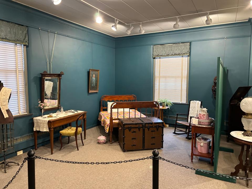 A ladies' bedroom and sewing area are on view in the new Tioga County Historical Society exhibit.