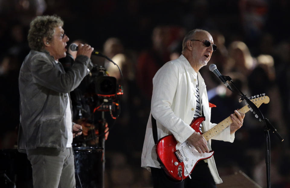 The Who guitarist Pete Townsend, right, and singer Roger Daltrey perform during the Closing Ceremony at the 2012 Summer Olympics, Monday, Aug. 13, 2012, in London. (AP Photo/Matt Slocum)