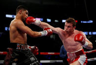 Boxing - Saul 'Canelo' Alvarez v Amir Khan WBC Middleweight Title - T-Mobile Arena, Las Vegas, United States of America - 7/5/16Canelo Alvarez and Amir Khan in actionAction Images via Reuters / Andrew CouldridgeLivepic