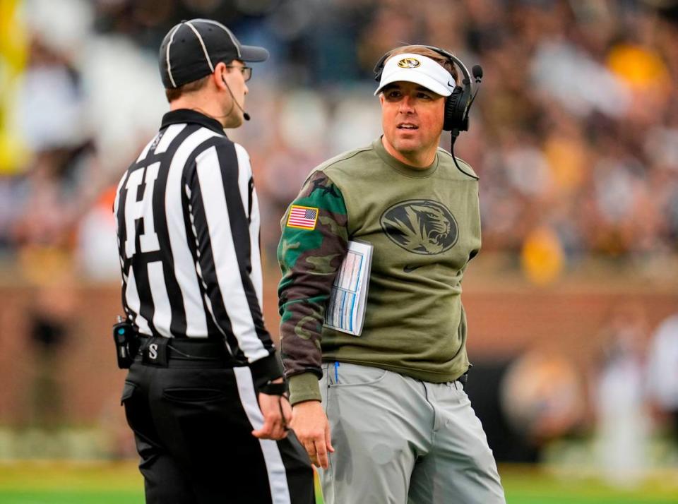 Missouri Tigers football coach Eliah Drinkwitz talks with head linesman Carl Gioia during Saturday’s game against the Tennessee Volunteers at Faurot Field. Jay Biggerstaff/USA TODAY Sports