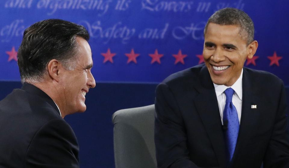 President Barack Obama and Republican presidential nominee Mitt Romney smile during the third presidential debate at Lynn University, Monday, Oct. 22, 2012, in Boca Raton, Fla. (AP Photo/Pool-Rick Wilking)