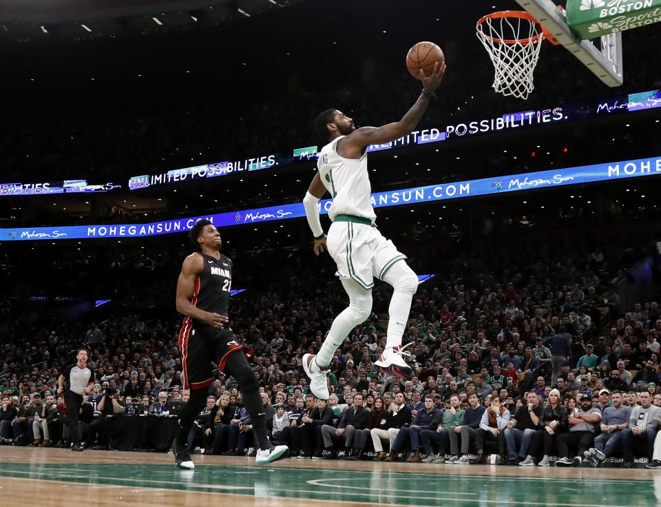 Kyrie Irving dropped 26 points and 10 assists on Monday night to lead the Boston Celtics past the Miami Heat for their fourth straight win. (AP/Winslow Townson)