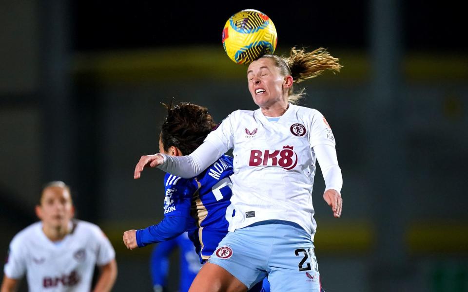 Noelle Maritz heads the ball for Aston Villa Women against Sunderland in the Conti Cup