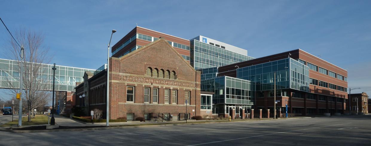 The original Erie Insurance building, center, is surrounded by recent construction of new buildings at the Erie campus.