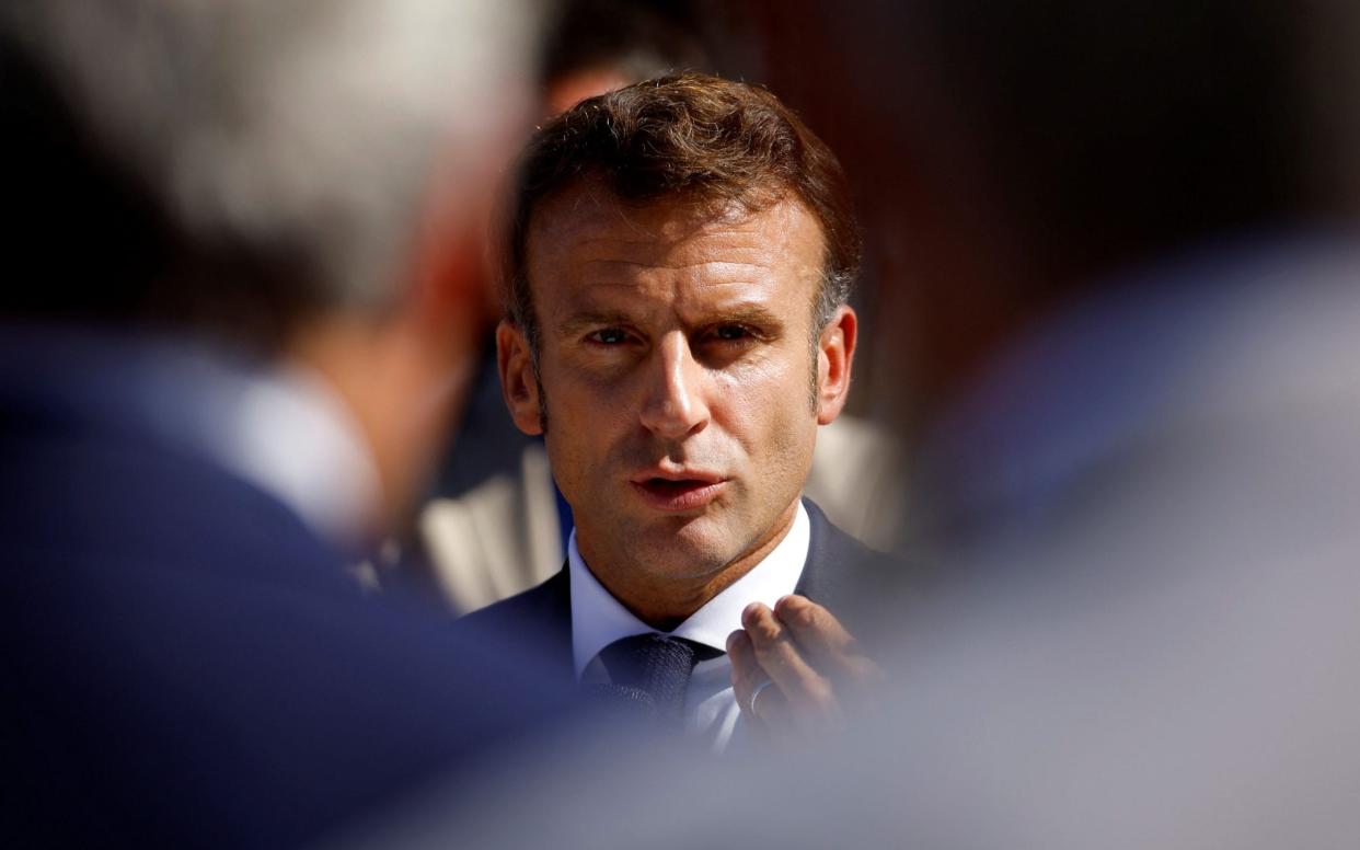 Emmanuel Macron has argued that getting French people to work longer is crucial to redressing the country’s debt-ridden public finances - STEPHANE MAHE /REUTERS