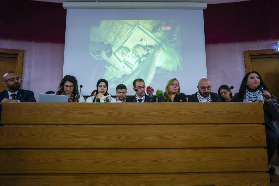 Family members of Palestinians living in Gaza attend a press conference at The Vatican after meeting with Pope Francis, Wednesday, Nov. 22, 2023. Pope Francis, before his Wednesday's general audience, met with family members of Palestinians living in Gaza and of the over 220 Israeli abducted by Hamas militants on Oct. 7 and believed to be held hostages in Gaza. (AP Photo/Andrew Medichini)
