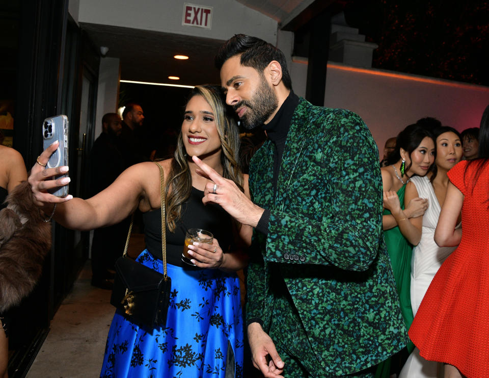 Hasan Minhaj and Deepti Vempati take a selfie at the API Excellence Celebration