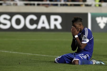 Cyprus' Dossa Junior reacts during the Euro 2016 group B qualification match against Bosnia at the GSP stadium in Nicosia, Cyprus October 13, 2015. REUTERS/Yiannis Kourtoglou