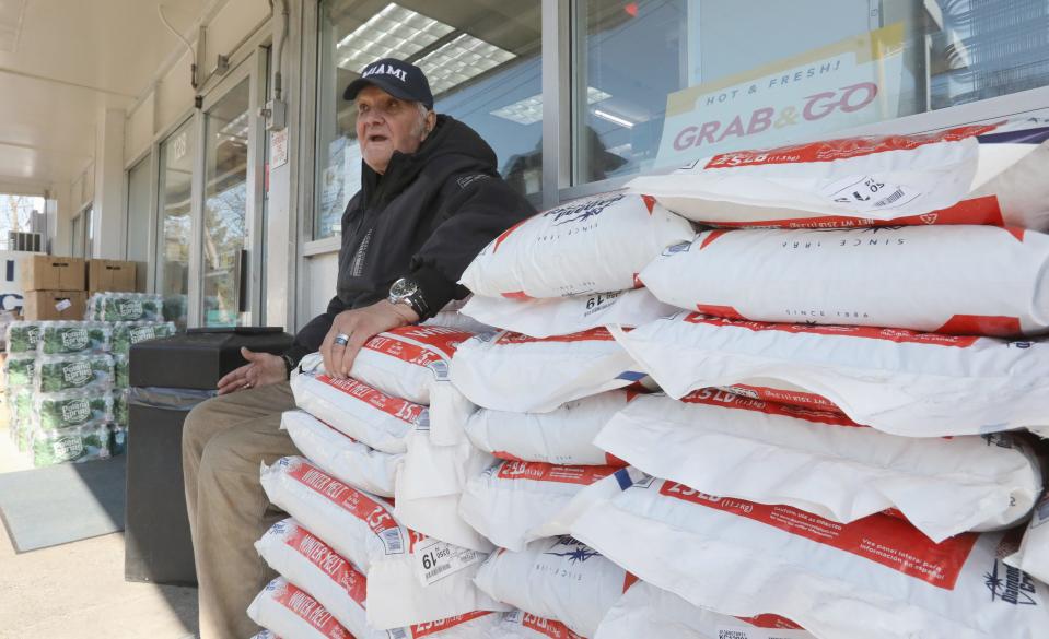 Jimmy Sievers at Sunoco A+1 gas station in New City with a stack of unsold snow melt salt on Feb. 15, 2023. He says this would all be sold by this time in a normal winter.