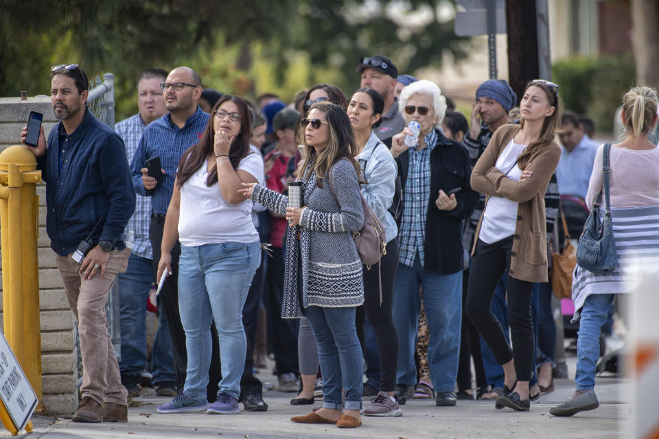 Parents wait for children to be released at Highlands Elementary near Saugus High School following a shooting at Saugus High School, Thursday, Nov. 14, 2015 in Santa Clarita, Calif. (Hans Gutknecht/The Orange County Register via AP)