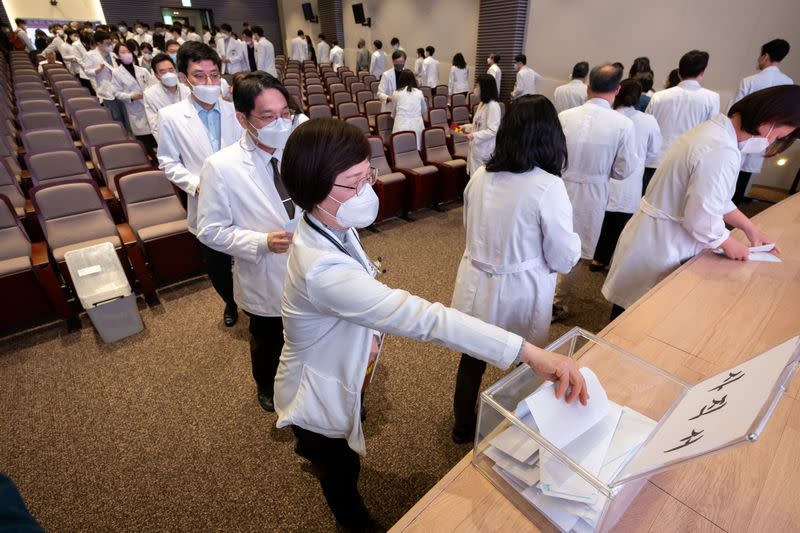 A professor at a medical school submits a resignation form at a hospital in Seoul