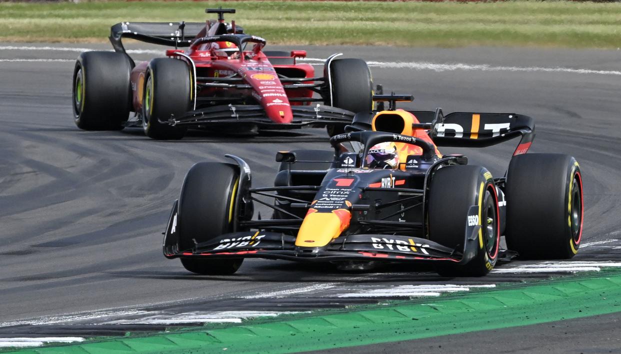 F1 Red Bull Racing's Dutch driver Max Verstappen (R) leads Ferrari's Monegasque driver Charles Leclerc  as they drive during the Formula One British Grand Prix at the Silverstone motor racing circuit in Silverstone, central England on July 3, 2022. (Photo by JUSTIN TALLIS / AFP) (Photo by JUSTIN TALLIS/AFP via Getty Images)