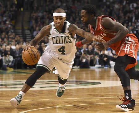 Jan 25, 2017; Boston, MA, USA; Boston Celtics guard Isaiah Thomas (4) controls the ball while Houston Rockets guard Patrick Beverley (2) defends during the second half at TD Garden. Mandatory Credit: Bob DeChiara-USA TODAY Sports