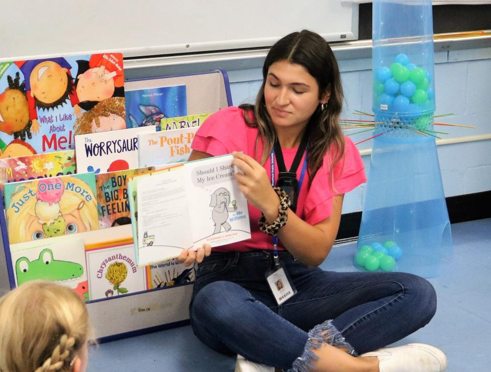 Amalia Montes, a special education teacher at the Lincoln Early Childhood Center, reads to students during the summer session of the Extended School Year (ESY) Program, in its 20th year in the Westfield Public Schools.