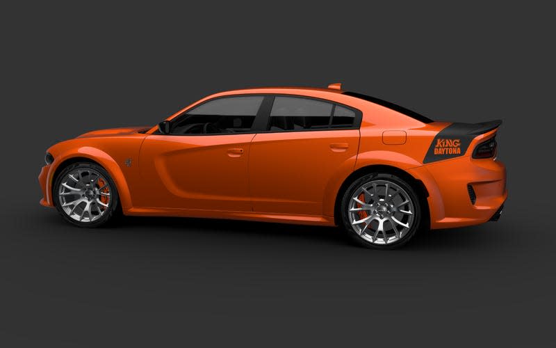 An orange Dodge Challenger King Daytons