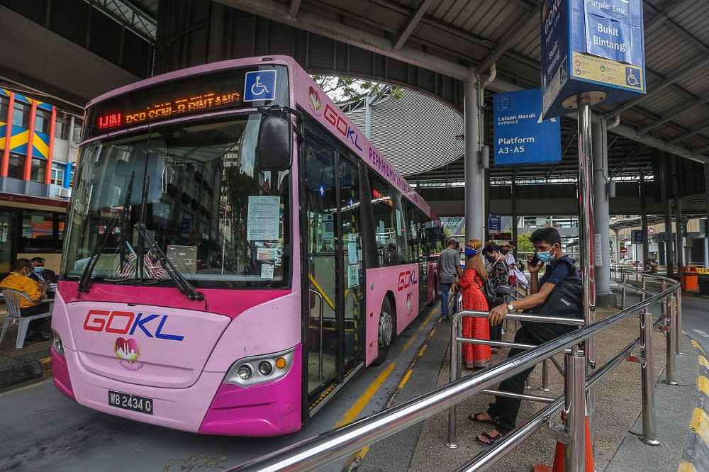 People are seen waiting for the bus in Kuala Lumpur October 28, 2021. ― Picture by Yusof Mat Isa