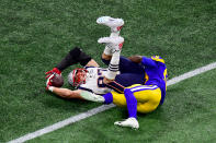 <p>Cory Littleton #58 of the Los Angeles Rams tackles Rob Gronkowski #87 of the New England Patriots in the second quarter during Super Bowl LIII at Mercedes-Benz Stadium on February 03, 2019 in Atlanta, Georgia. (Photo by Scott Cunningham/Getty Images) </p>
