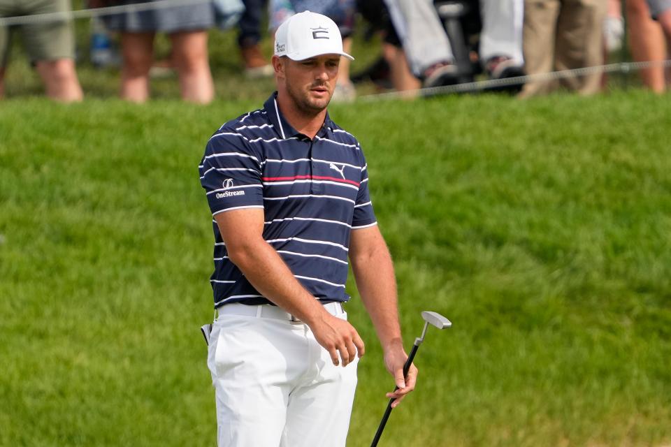 Jun 2, 2022; Dublin, Ohio, USA; Bryson DeChambeau reacts to his putt on 18 during the first round of the Memorial Tournament at Muirfield Village Golf Club on June 2, 2022. DeChambeau finished the opening round at +4. Mandatory Credit: Adam Cairns-The Columbus Dispatch