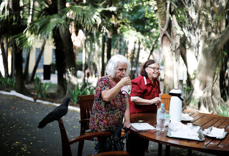 Senior citizens have a snack at Agua Branca park in Sao Paulo, Brazil, February 20, 2019. REUTERS/Nacho Doce