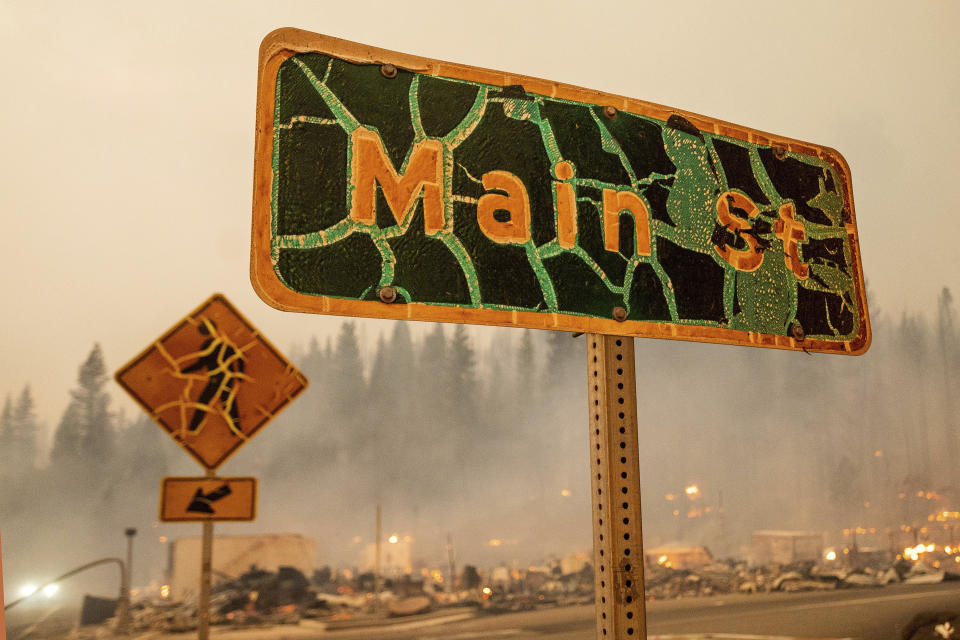 A street sign stands in central Greenville as the Dixie Fire tears through Plumas County, Calif., on Wednesday, Aug. 4, 2021. (Noah Berger/AP)