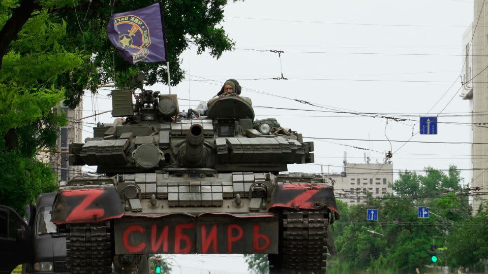 Members of Wagner group sit atop of a tank in a street in the city of Rostov-on-Don, on June 24, 2023.  - Stringer/AFP/Getty Images