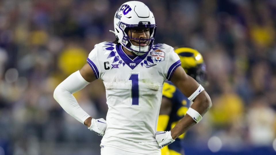 Dec 31, 2022; Glendale, Arizona, USA; TCU Horned Frogs wide receiver Quentin Johnston (1) against the Michigan Wolverines during the 2022 Fiesta Bowl at State Farm Stadium.