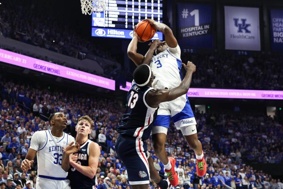 Kentucky guard Adou Thiero (3) drives to the basket against Gonzaga forward Graham Ike (13) during Saturday’s game at Rupp Arena.