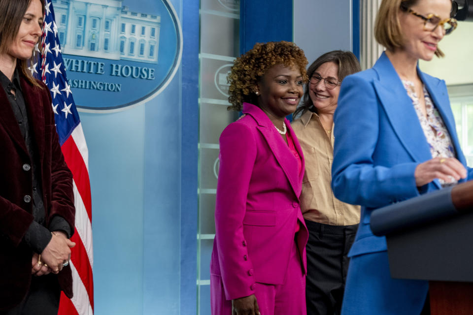 Cast members of "The L Word" Katherine Moennig, left, and Leisha Hailey, right, along with television producer and "The L Word" co-creator Ilene Chaiken, second from right, join White House press secretary Karine Jean-Pierre, center, to mark Lesbian Visibility Week during a press briefing at the White House in Washington, Tuesday, April 25, 2023. (AP Photo/Andrew Harnik)