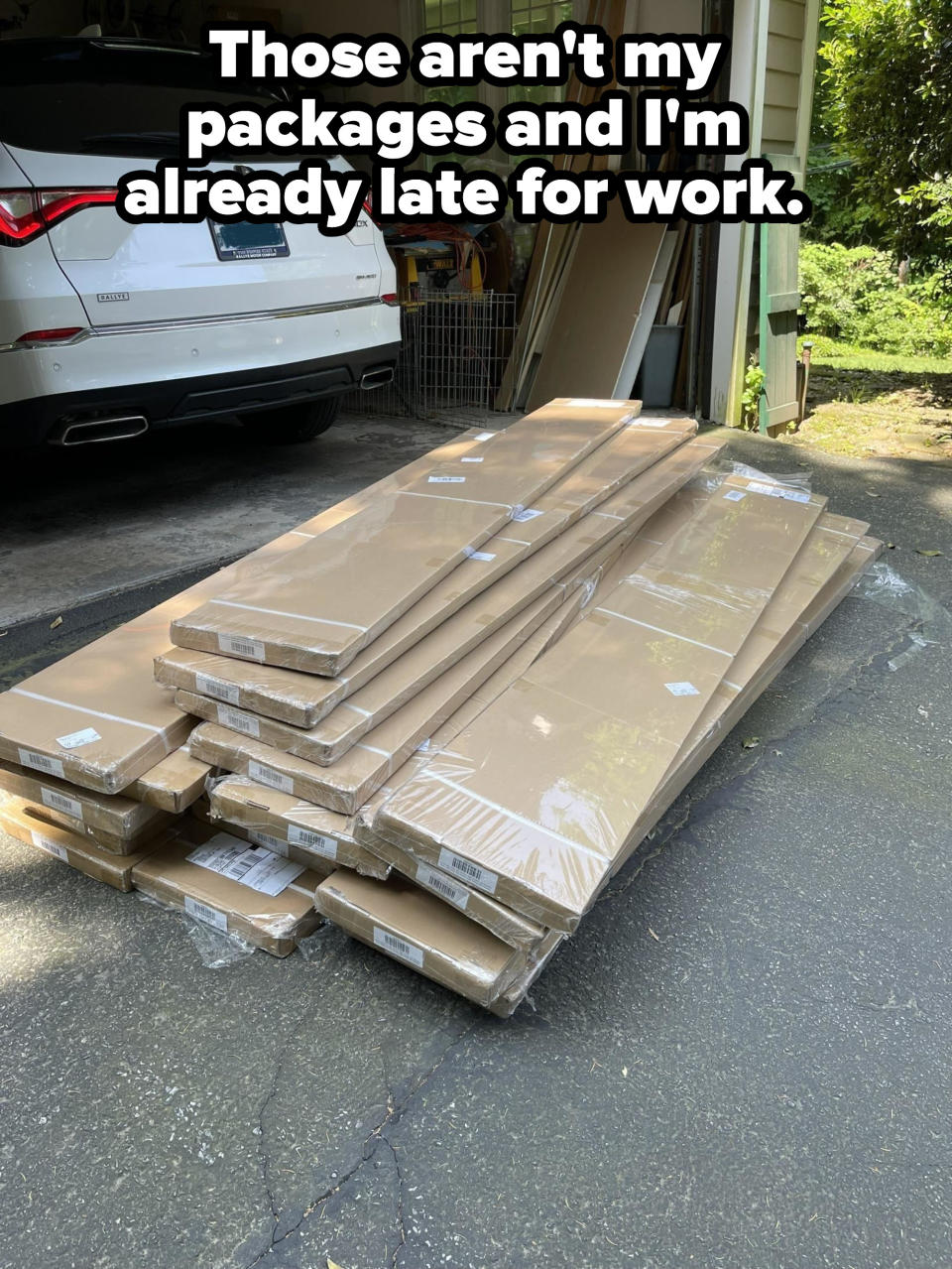 wood blocking a car in the driveway