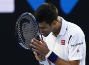 Serbia's Novak Djokovic reacts during his fourth round match against France's Gilles Simon at the Australian Open tennis tournament at Melbourne Park, Australia, January 24, 2016. REUTERS/Thomas Peter